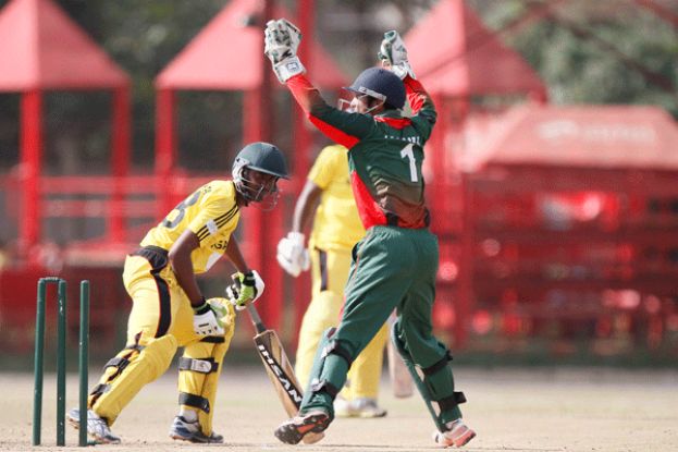 Deus Muhumuza survives a sharp stumping appeal from Kenya wicketkeeper Kavi Dosaja during the ODI series last weekend. Muhumuza was the man-of-match with a haul of five wickets and unbeaten knock of 16 not out. PHOTO BY Martin Mukangu