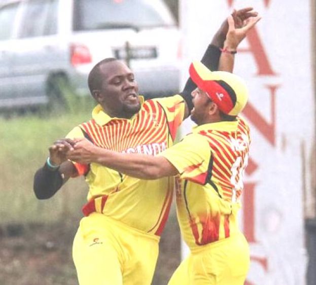 Roger Mukasa and a colleague celebrate during a past game. Photo BY ICC/MCA 