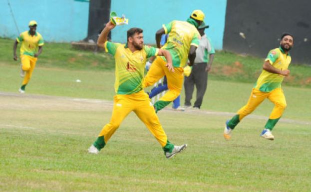 Have it all to do. Aziz Damani all-rounder Saud Islam celebrates a wicket during their match against Kutchi Tigers earlier in the season. PHOTO BY EDDIE CHICCO
