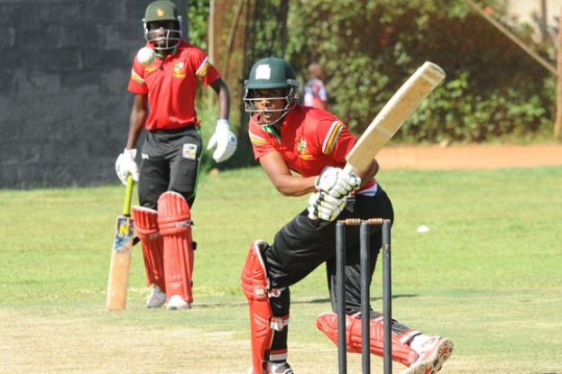Zimbabwe international Tymcen Maruma (R) hits a boundary to the leg-side against Uganda XI enroute to a three-wicket victory on the opening day of the Quadrangular Series. The victory proved vital in Takashinga’s quest to win the series. PHOTO BY EDDIE CHICCO 