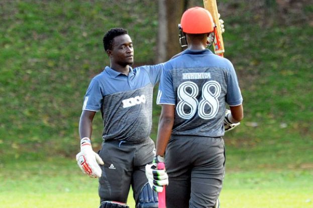 Cricket. KICC’s new signings Simon Ssesazi (left) reached a half ton and featured in a winning partnership with Deus Muhumuza on their first weekend of action against Kutchi Tigers in the national U-20 tournament.  