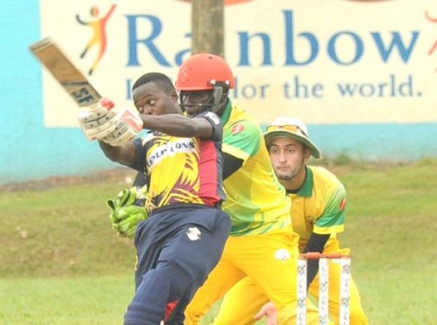 Ceylons Lions captain Lawrence Ssempijja (batting) and Damani’s pair; Riazat Ali Shah and Fred Achelam have work to do for their teams today. PHOTOS BY EDDIE CHICCO  