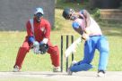 Lubega hits out in his match-winning knock of 35 at Lugogo Oval yesterday. Keeping wickets for Tornado is veteran Davis Turinawe. photo by EDDIE CHICCO 