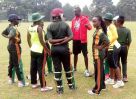 The Tornado Bee Coach ;Ogwang Jackson talking to his players during their match against Charity CC at Entebbe Oval