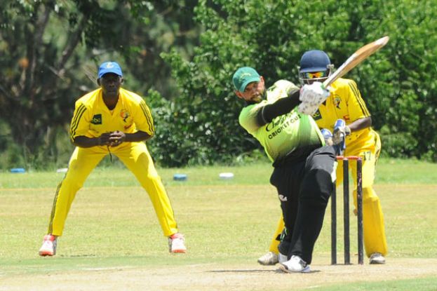 Master blaster: Challengers’ heavy-hitting batsman Irfan Afridi smashing a boundary in the last encounter between his side and Aziz Damani. PHOTO BY EDDIE CHICCO 