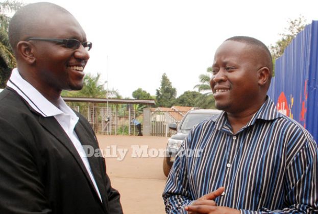 UCA chairman Mwami (R) and CEO Justine Ligyalingi are working to ensure UCA operate within NCS regulations. PHOTO By EDDIE CHICCO 